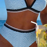 "Divkrāsu teksturēts bikini ar divām siksnām" can be rewritten as "Divkrāsu teksturēts bikini ar divām siksnām" (the title is already clear and descriptive). However, if you're looking for a more engaging option, you could try:

"Divkrāsu teksturēts bikin