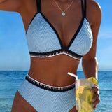 "Divkrāsu teksturēts bikini ar divām siksnām" can be rewritten as "Divkrāsu teksturēts bikini ar divām siksnām" (the title is already clear and descriptive). However, if you're looking for a more engaging option, you could try:

"Divkrāsu teksturēts bikin