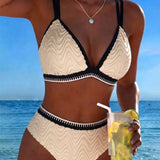"Divkrāsu teksturēts bikini ar divām siksnām" can be rewritten as "Divkrāsu teksturēts bikini ar divām siksnām" (the title is already clear and descriptive). However, if you're looking for a more engaging option, you could try:

"Divkrāsu teksturēts bikin