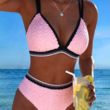 "Divkrāsu teksturēts bikini ar divām siksnām" can be rewritten as "Divkrāsu teksturēts bikini ar divām siksnām" (the title is already clear and descriptive). However, if you're looking for a more engaging option, you could try:

"Divkrāsu teksturēts bikin