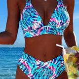 Divdaļīgs bikini ar apdrukātu kakla daļu un mezglu" can be rewritten as:

"Divdaļīgs bikini ar stilīgu apdrukātu kakla daļu un mezglu